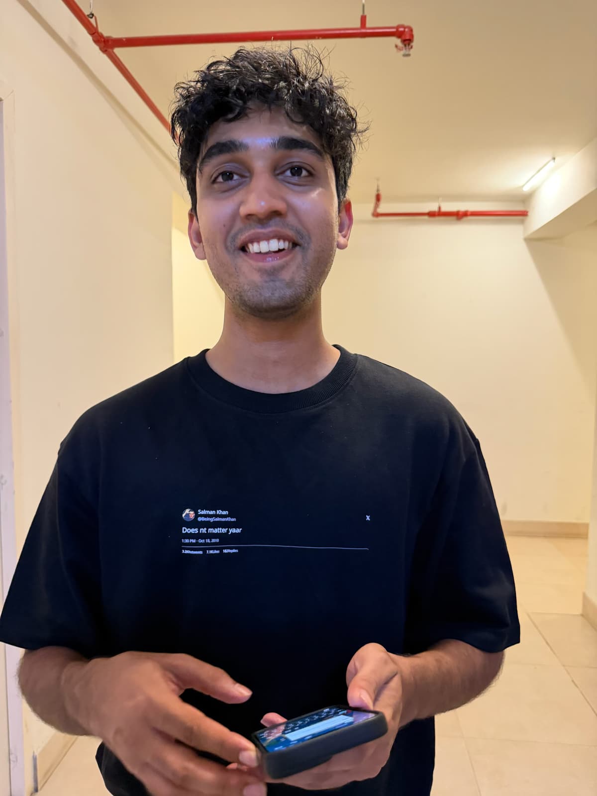 Ken wearing their tweet tee